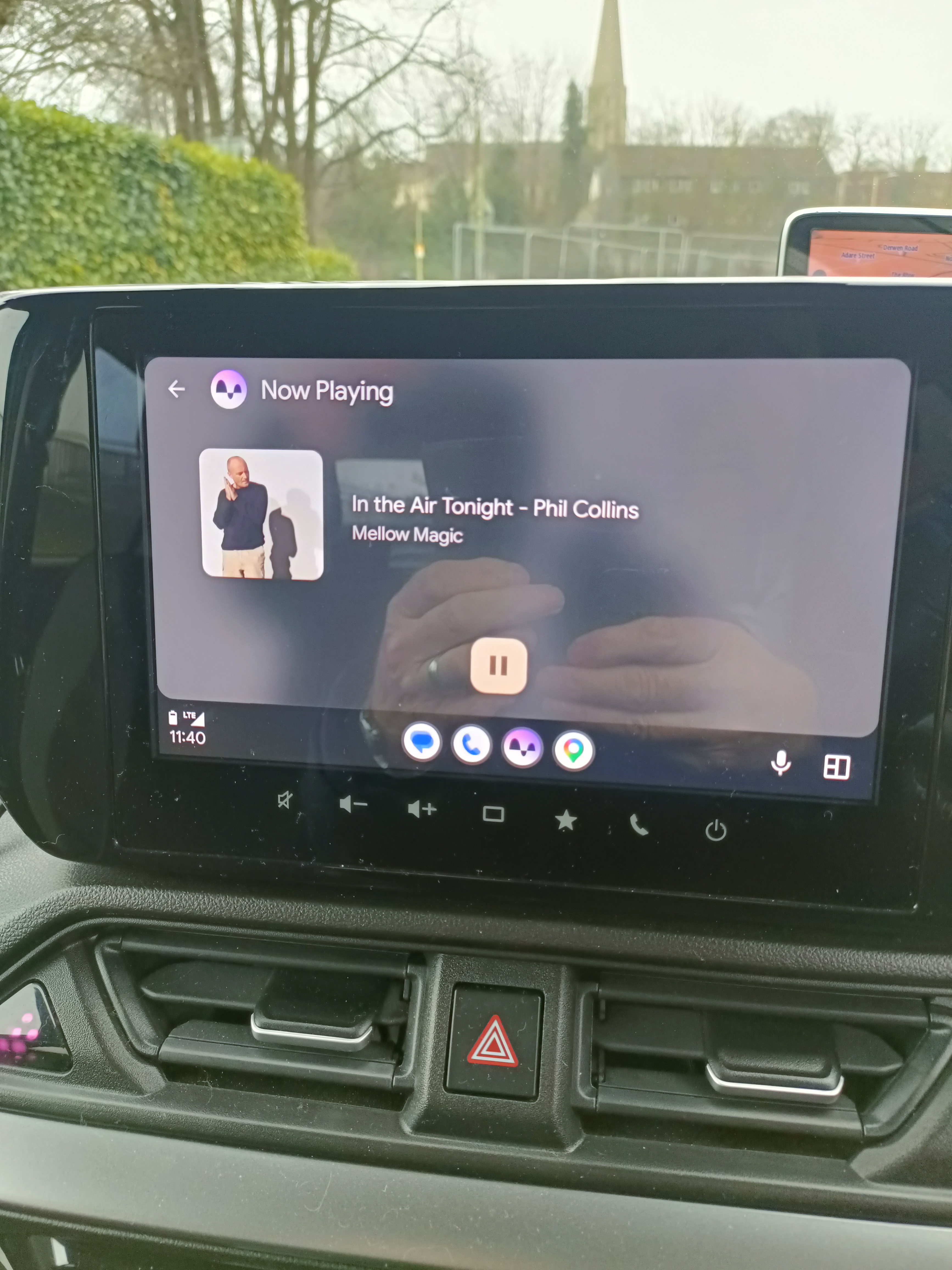 Car’s central touchscreen displaying Android Auto with music, messages, phone options and Google Maps navigation Car’s central touchscreen displaying Android Auto with music, messages, phone options and Google Maps navigation