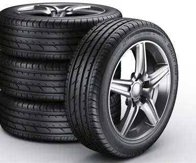 Three stacked car tyres with one tyre upright leaning against them from Blackcircles.” Three stacked car tyres with one tyre upright leaning against them from Blackcircles.”